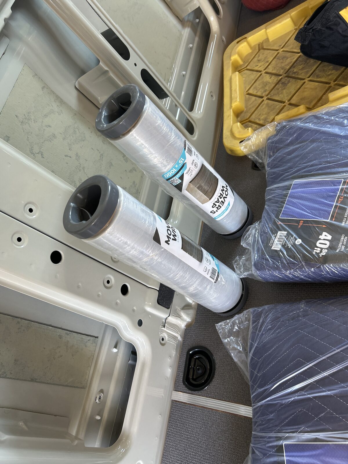 Stretch wrap and furniture moving pads